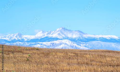 First mountain snow of the year on the peak of Mount Meeker and Longs Peak in the Rockies, Colorado
