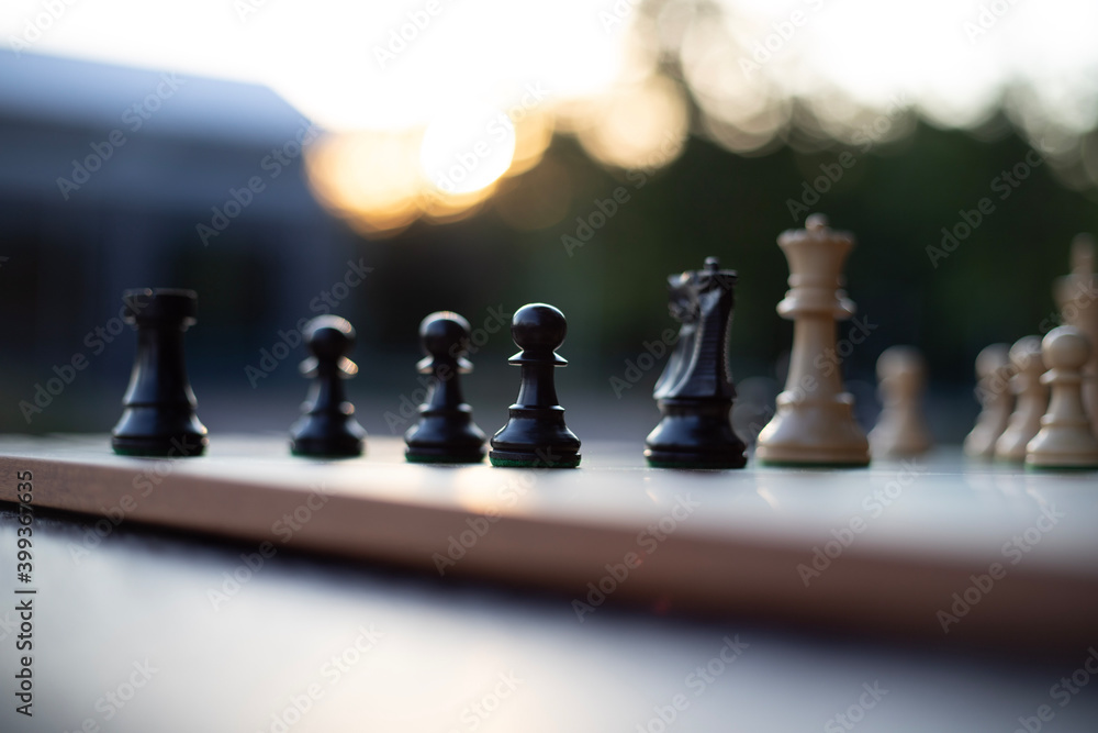A chess set outside in the summer A chess set outside in the summer