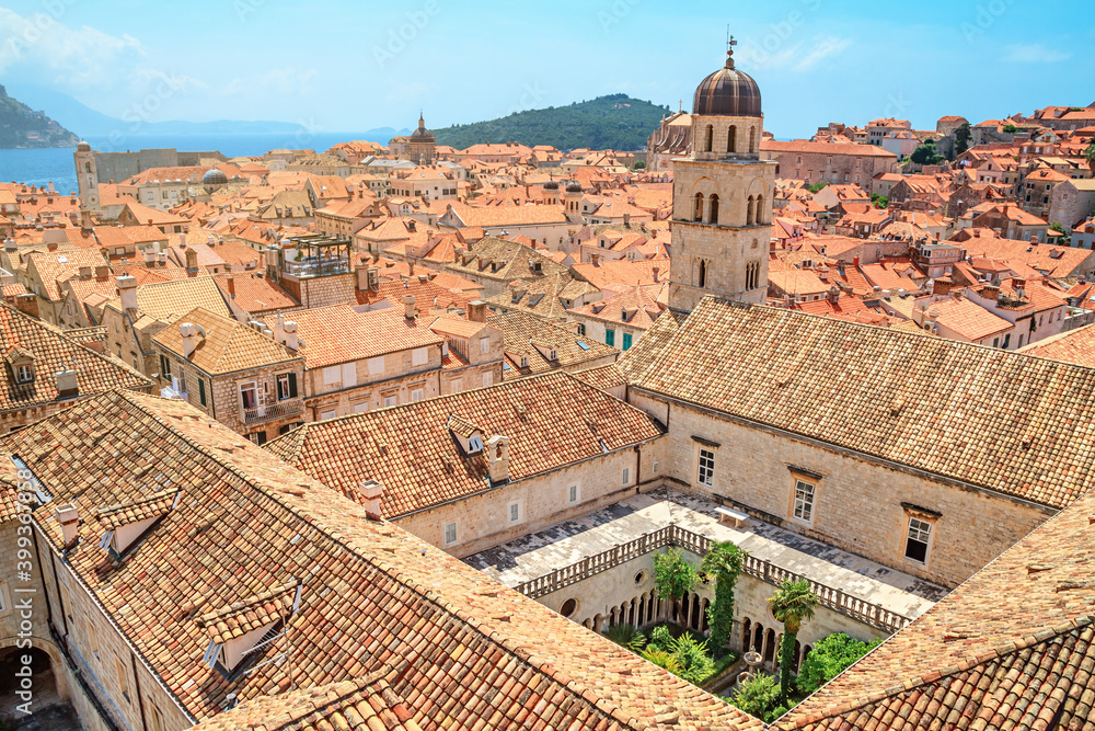 Obraz premium Summer cityscape - top view of the Franciscan Church with Monastery and the Old Town of Dubrovnik on the Adriatic Sea coast of Croatia
