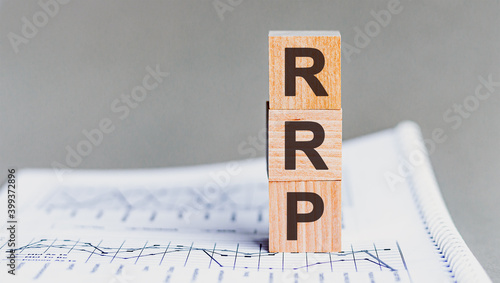 letter of the alphabet of RRP on a grey background. RRP - Recommended Retail Price photo