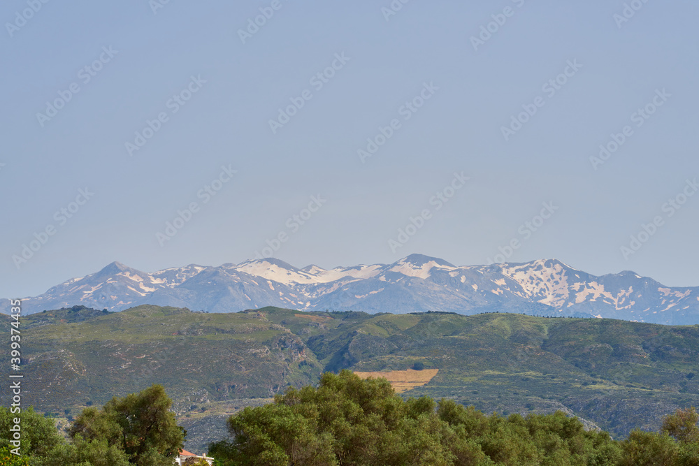 The hills and mountains with snowy peaks in Crete.