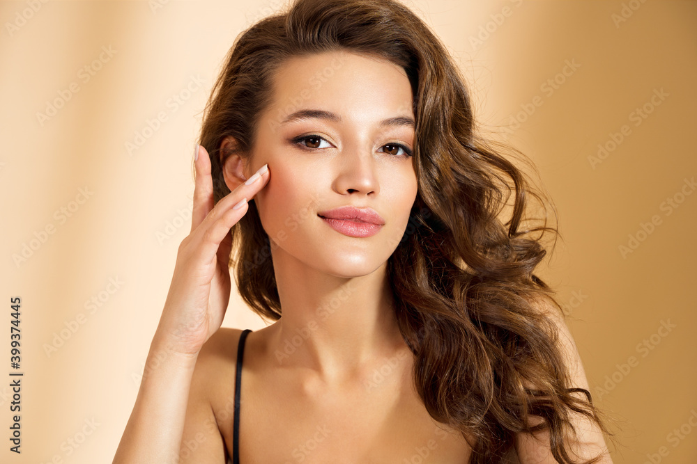 Beautiful woman with perfect makeup on beige background. Beauty and skin care concept Beautiful woman with perfect makeup on beige background. Beauty and skin care concept