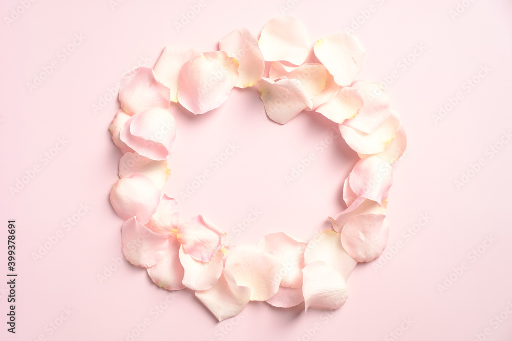 Rose petal wreath on pink background. Flat lay, top view. Happy Valentines Day concept.