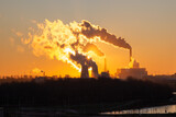 Beautiful sunrise over the power plant. Southern Thermal Power Plant St. Petersburg Russia. Smoke from chimneys.