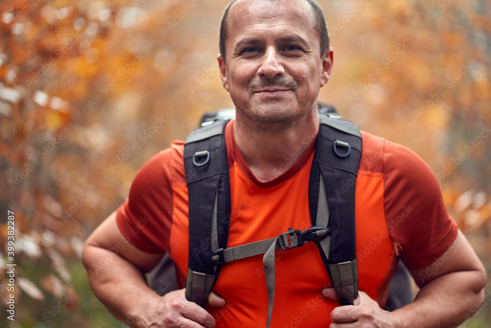 Fototapeta premium Hiking into the foggy forest