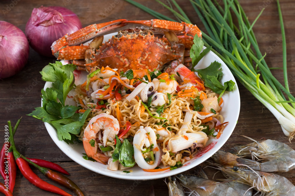 Thai spicy seafood salad with Mama noodles