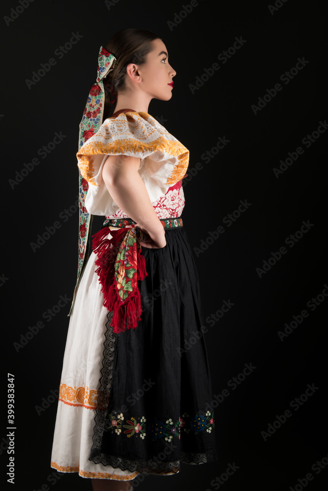 Slovak folklore. Slovakian folklore girl. Beuatiful young girl in slovak folk dress