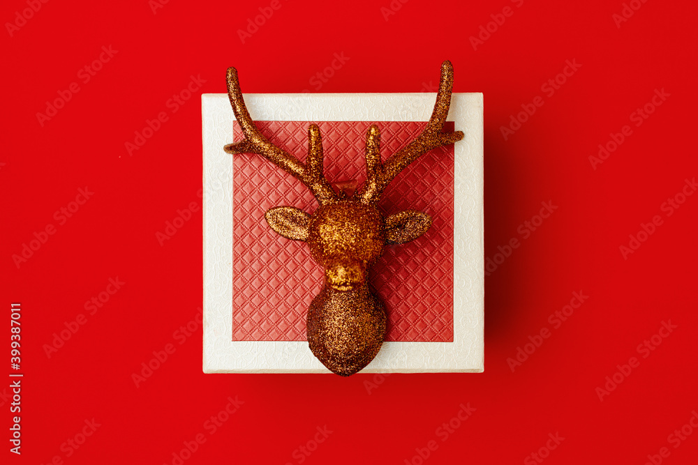flat lay with christmas reindeer and present box flat lay with christmas reindeer and present box