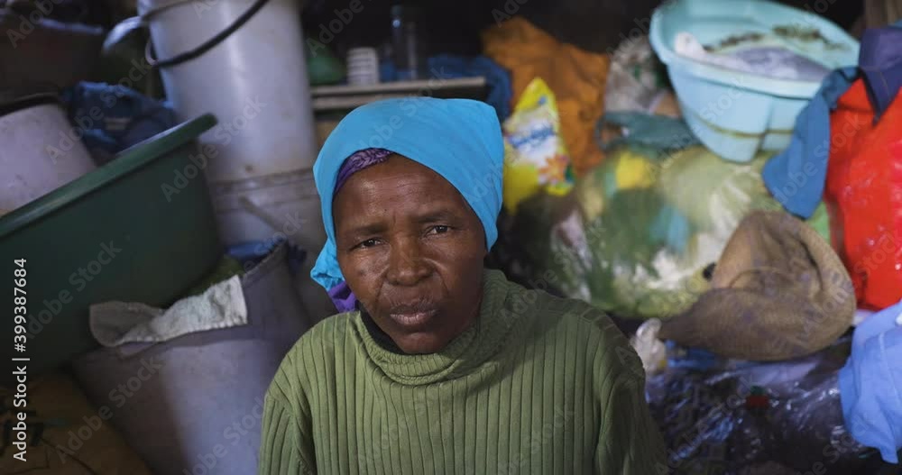 Face Of Poverty Close up View Of A Poor Black African Woman Sitting In 