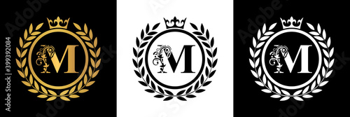  Letter M laurel wreath template logo Luxury gold letter with crown. Monogram alphabet . Beautiful royal initials letter.	