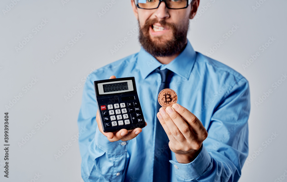 Bearded business man financier calculator currency finance market technology Bearded business man financier calculator currency finance market technology