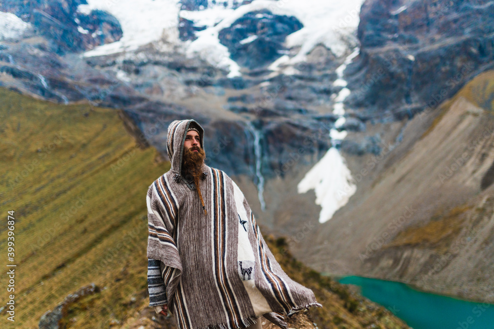 Man surrounded by high mountains Man surrounded by high mountains