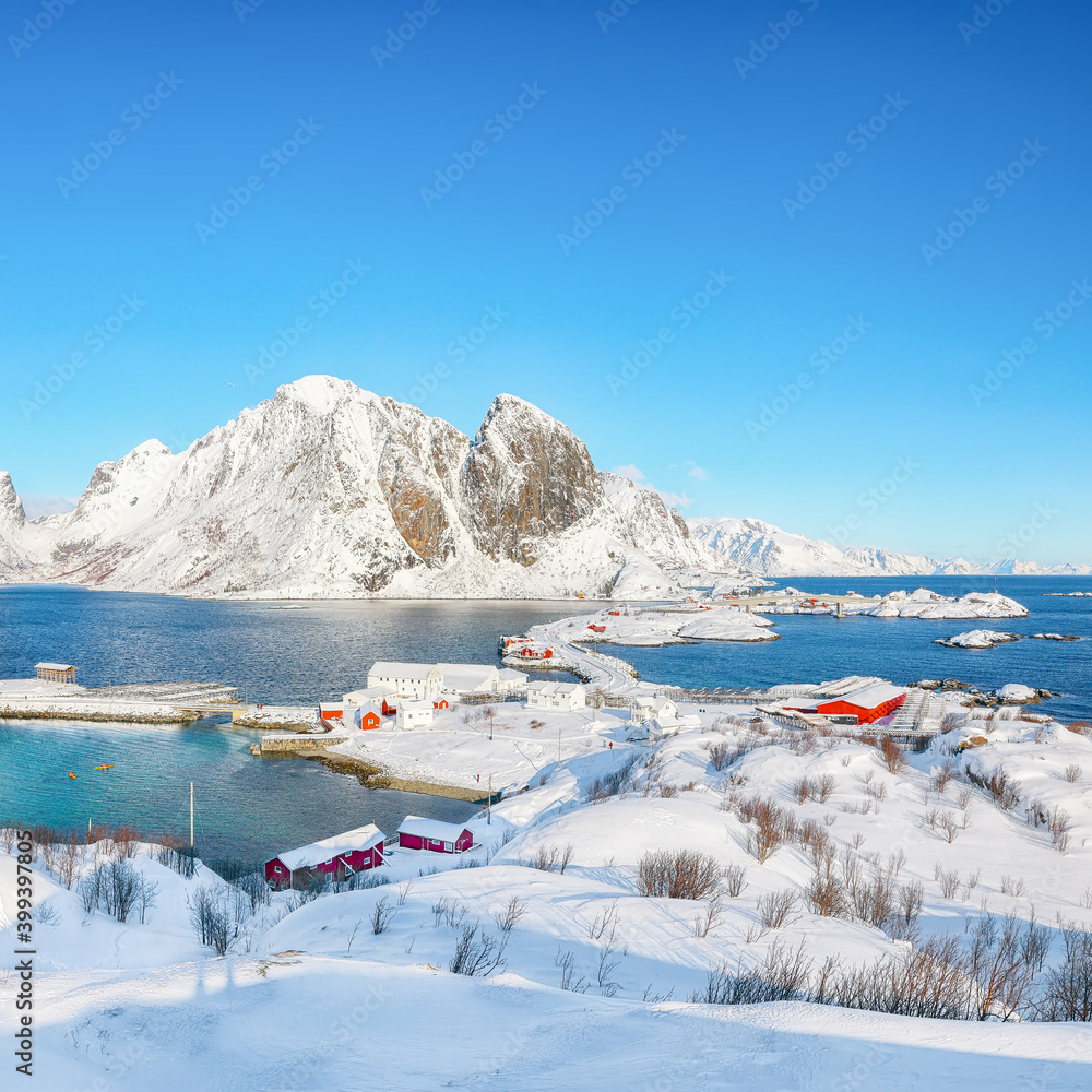 Fabulous winter view of Hamnoy  fishing village and bridge seen from Olenilsoya island