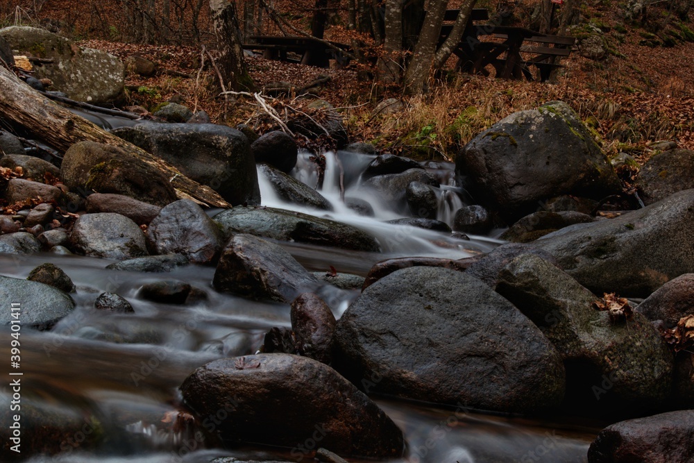 Beautiful view on the overfall of the little mountain river Beautiful view on the overfall of the little mountain river