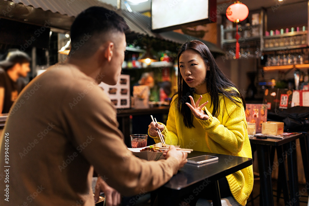 Chinese woman smiling at her boyfriend. Chinese woman smiling at her boyfriend.