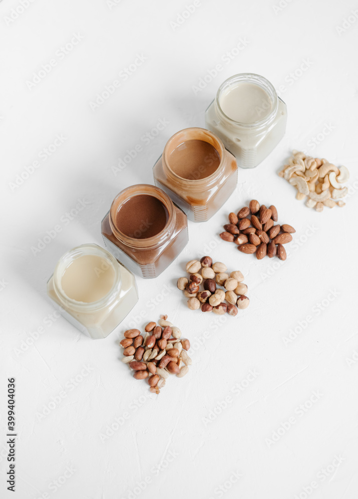 Various nut butter in jars Various nut butter in jars