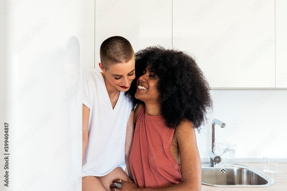 Beautiful lesbian couple at home Beautiful lesbian couple at home