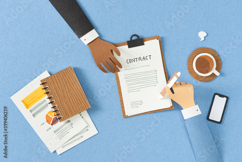 Businessman signing partnership agreement concept