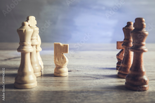 chess pieces on the wooden table