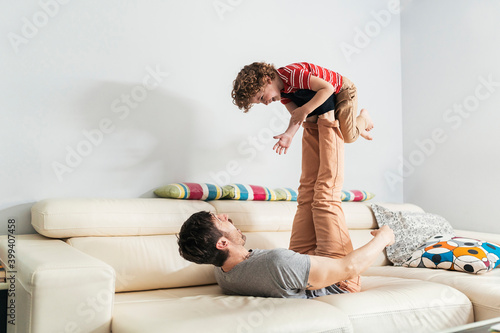 Father playing with his son.