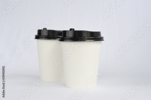 photo white cup plain on white background , mock up glass plastic