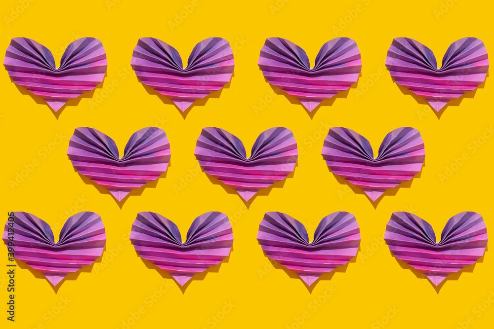 Pattern of pink and purple origami hearts Pattern of pink and purple origami hearts