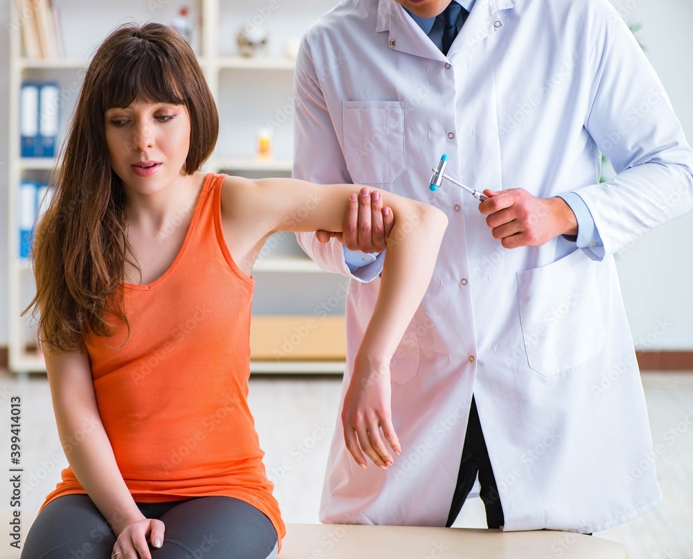 Fototapeta premium Doctor neurologist examining female patient