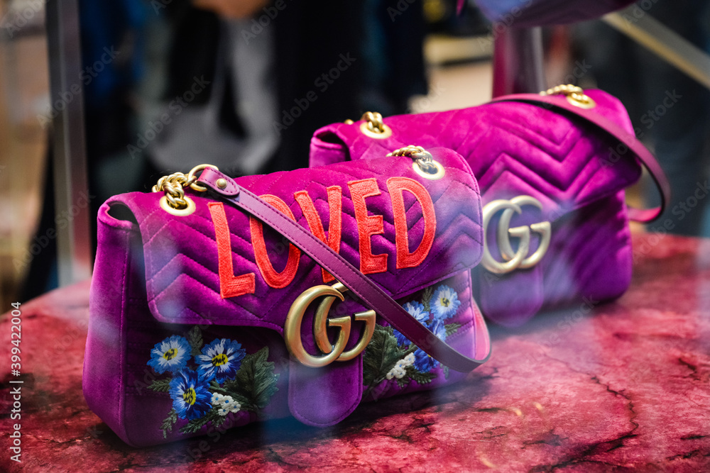 Milan, Italy - September 24, 2017: Gucci bag in a Gucci store in Milan.  Fashion week Stock Photo | Adobe Stock