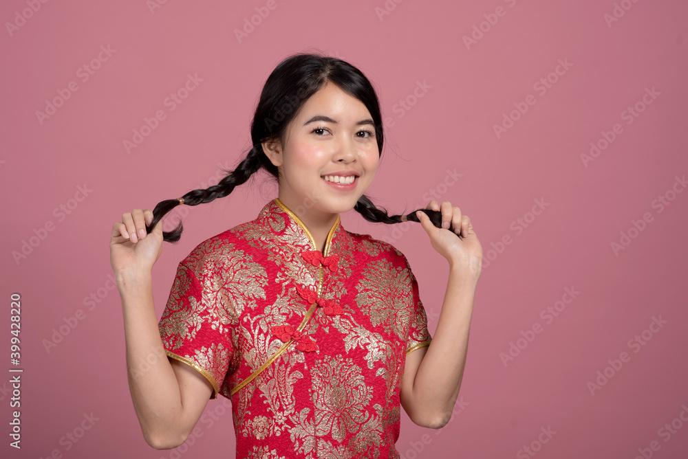 Portrait beautiful girl in the Cheongsam red dress Portrait beautiful girl in the Cheongsam red dress