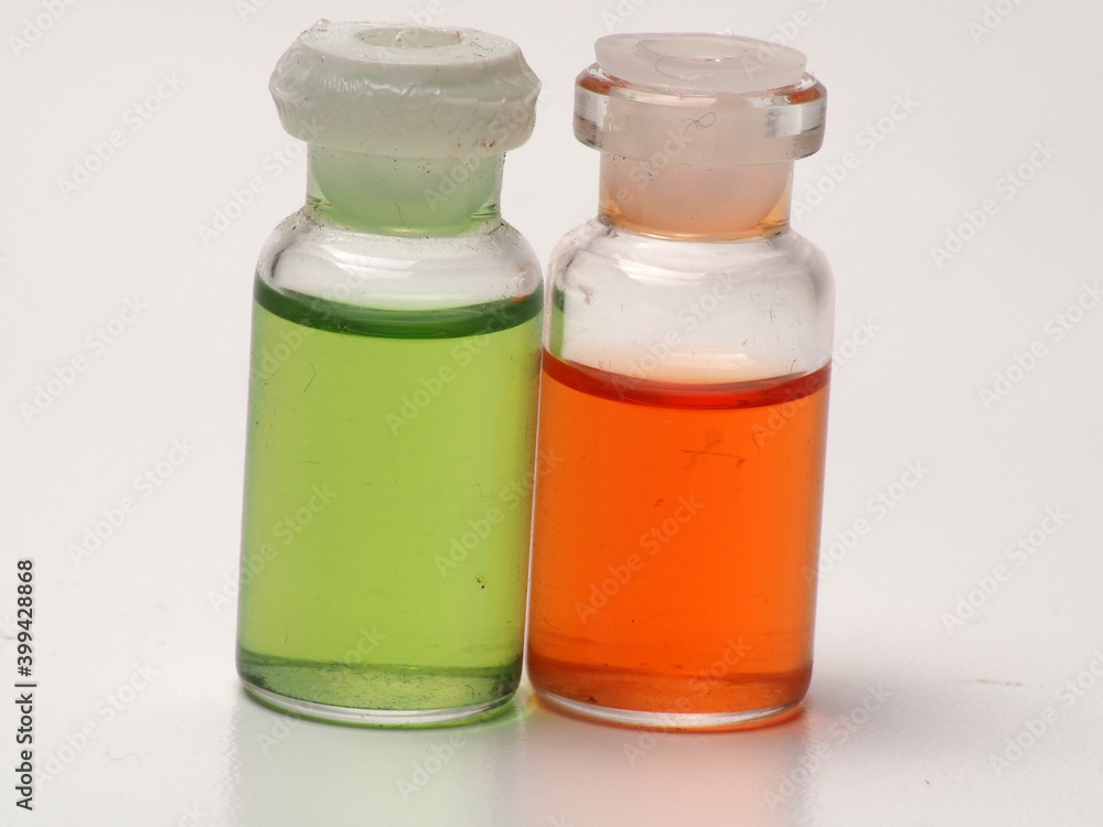 Close up shoot of vaccine on a bottle, capture on white isolated background Close up shoot of vaccine on a bottle, capture on white isolated background