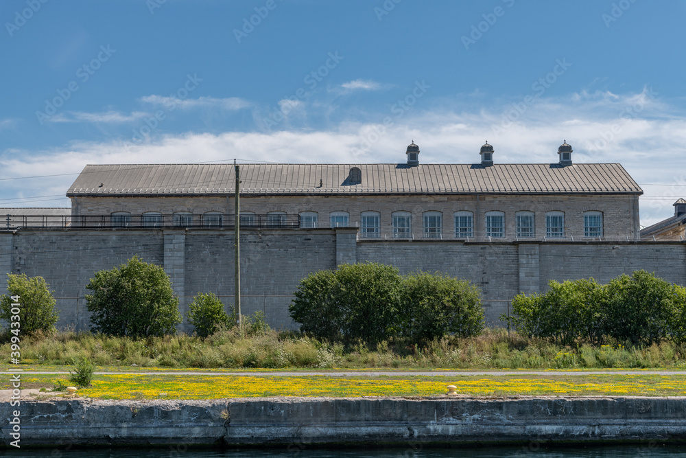 Penitentiary behind a brick wall landscape Penitentiary behind a brick wall landscape