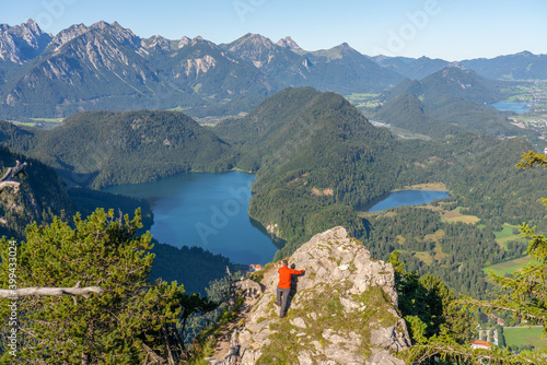 Tourist overlooking beautiful landscape of Schwangau. Southwest Bavaria. Germany 