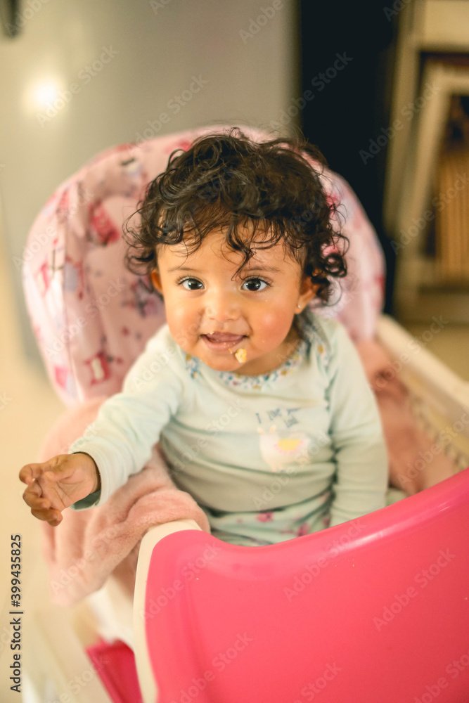 Adorable little baby portrait. Cute baby girl indoor. 6 month child smiling. Adorable little baby portrait. Cute baby girl indoor. 6 month child smiling.