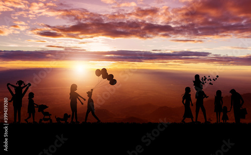 Silhouette of family and sky sunset background
