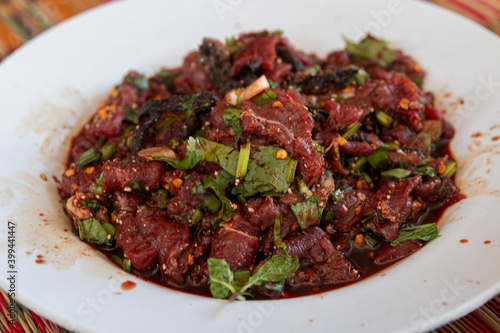 Raw beef Issan salad made from beef, herbs and blood (Larb Luad)