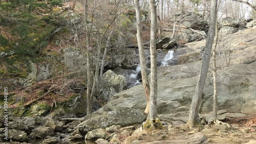 The large waterfall in Cunningham Falls State Park in the Catoctin Mountains in Frederick County, Maryland on a late autumn day. photo