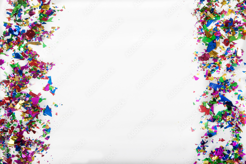 Obraz premium Christmas and New Year sparkles around the edges on a white background. Holiday concept. Copy space.