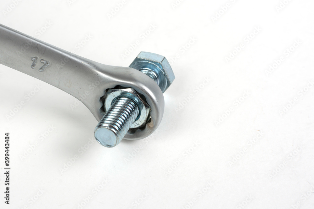 close-up of bolt with nut and tool close-up of bolt with nut and tool
