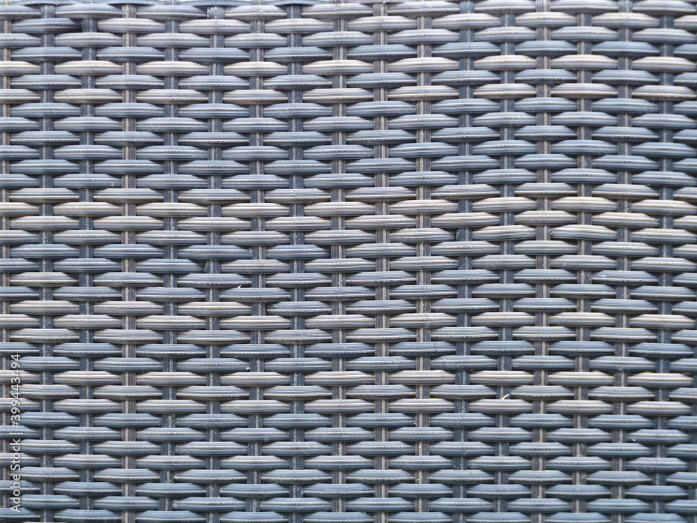 Wood that has been weaved together in a pattern Wood that has been weaved together in a pattern