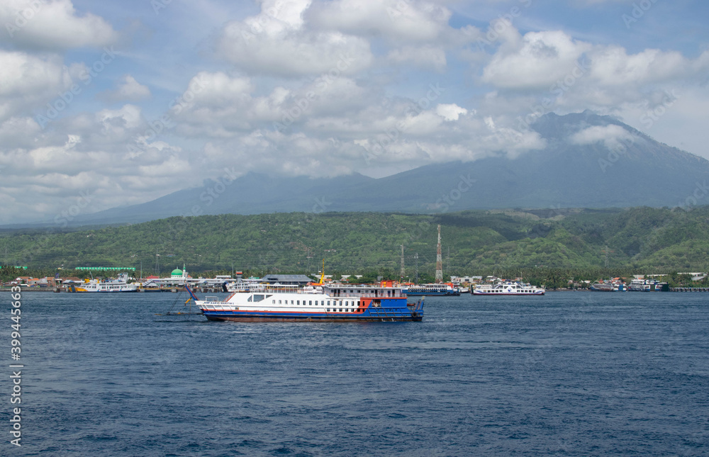 Banuwangi, Indonesia - November 17, 2020: The Ferry in the sea at Port of Ketapang, located in Ketapang Village, Banyuwangi Regency, East Java, Indonesia that connects eastern coast  of Java with Bali
