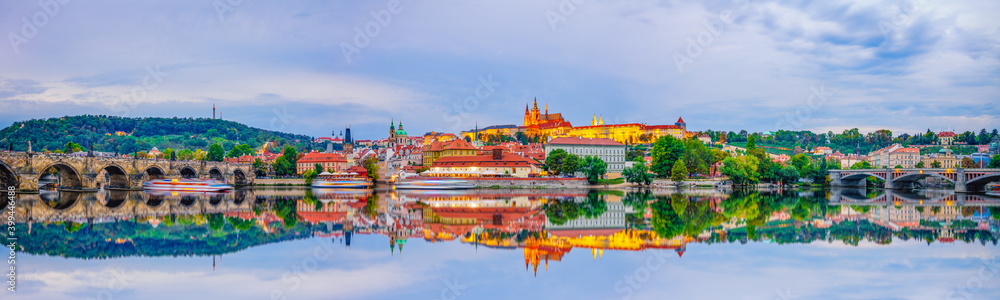 Panorama of Charles bridge and Prague castle with reflection in Prague. Czech Republic