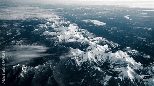 aerial view of mountains in the snow
