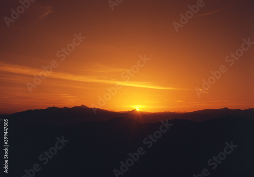 Wallpaper Mural The sun rising from the ridge of the mountain Torontodigital.ca