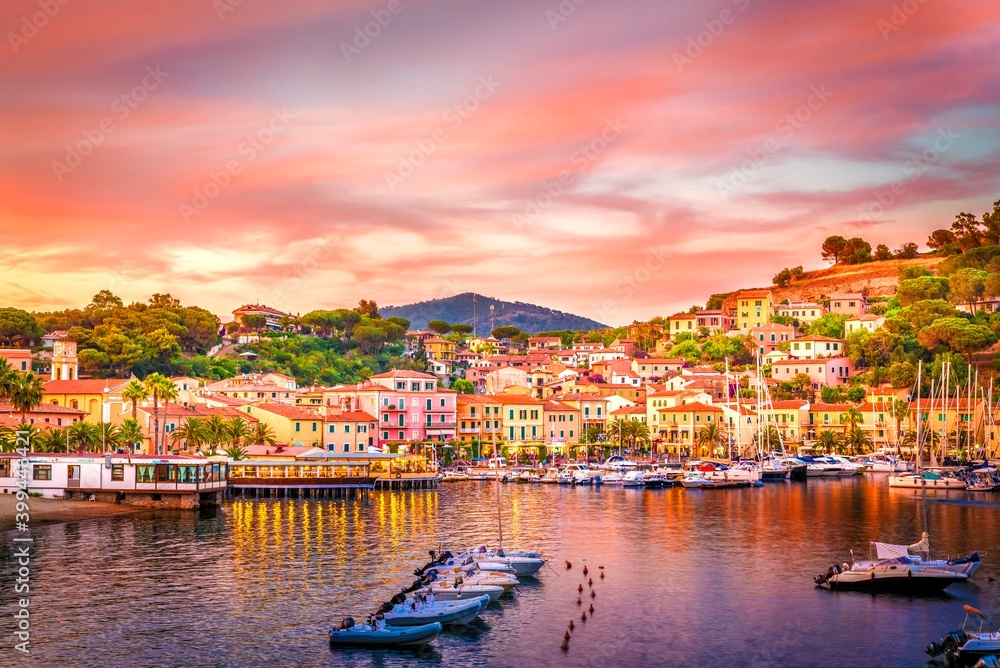 Harbor and village  Porto Azzurro at sunset, Elba islands, Tuscany, Italy.