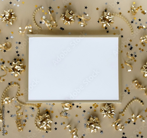 Gold frame mock up, new year  decorations in gold colors on gold background. ...