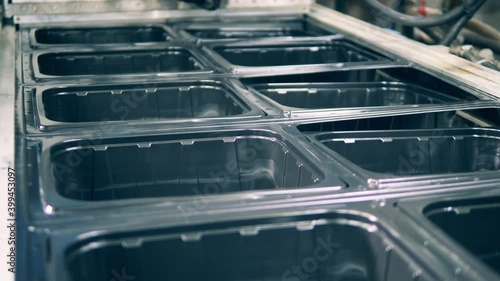 Black plastic containers thermoforming process photo