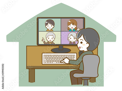 在宅で会議をする中年男性