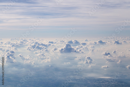 Top view from airplane over Phuket to Bangkok, Beautiful view on the mountains from the top through the clouds.