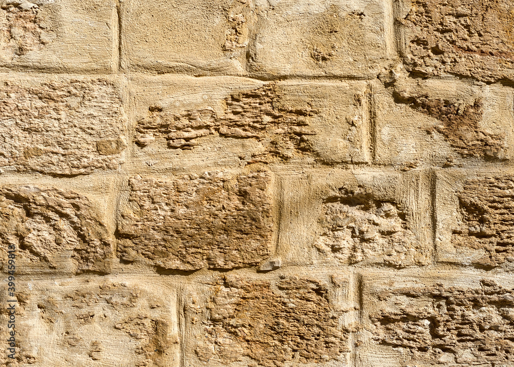 Ancient wall made of rectangular natural factured stones. Ancient wall made of rectangular natural factured stones.