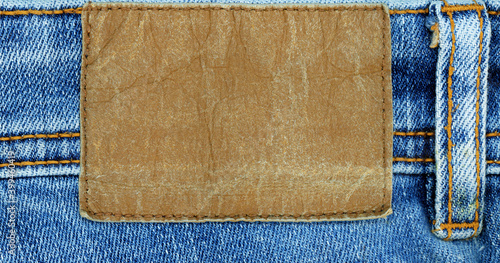 Obraz na plátne Leather jeans label sewed on jeans